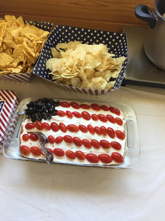 Old Glory Dip - Refried Beans, salsa, Guacamole, sour cream and cheese
